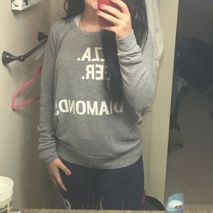 Gray long sleeved sweater shirt